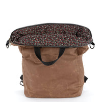 The Vega bag is fully lined. This waxed canvas bag is lined with liberty-style quilting cotton.