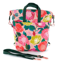 Remove the strap to use the convertible bag as a tote